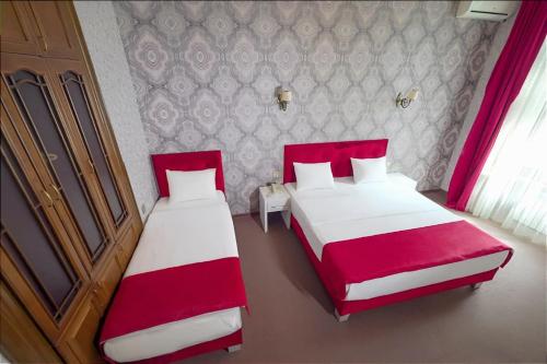 Nizami Boutique Hotelにあるベッド