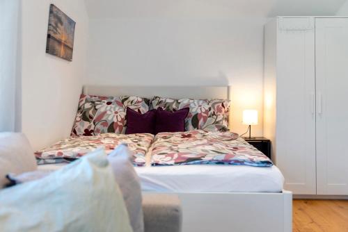 a bedroom with a large bed with at Ferienwohnung Sophia Inzell - Neu in Inzell