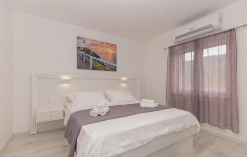 Ένα ή περισσότερα κρεβάτια σε δωμάτιο στο Star Hill - Makarska by Villas Guide