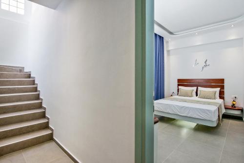 Ein Bett oder Betten in einem Zimmer der Unterkunft Petini's Place