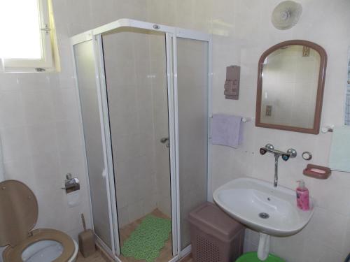 Kúpeľňa v ubytovaní Apartment Matogi