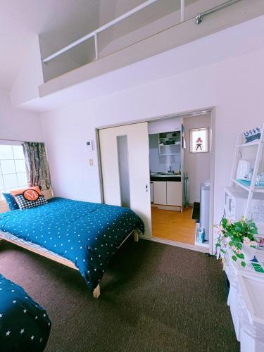 Ένα ή περισσότερα κρεβάτια σε δωμάτιο στο M-house