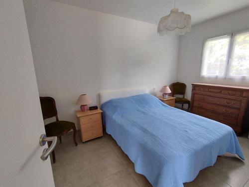 Postel nebo postele na pokoji v ubytování Chez Cécile