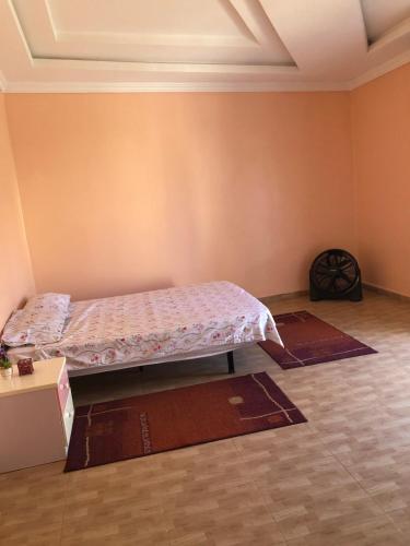 Katil atau katil-katil dalam bilik di Beachside Apartment in Sidi Frej