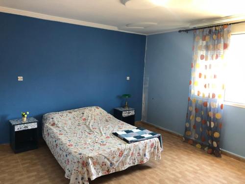 Katil atau katil-katil dalam bilik di Beachside Apartment in Sidi Frej