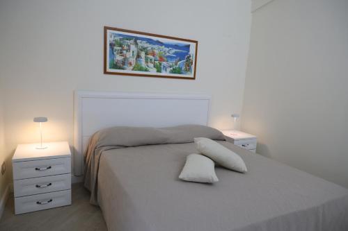 Giường trong phòng chung tại Villa Italia Sorrento