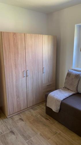 Postel nebo postele na pokoji v ubytování Gerbera Apartman