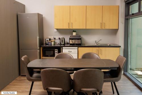 Kuchyň nebo kuchyňský kout v ubytování Madison House