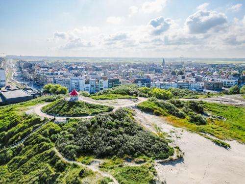 an aerial view of a city with buildings at Hoeve Langhof in Wenduine