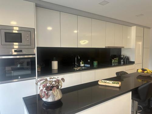 Cuisine ou kitchenette dans l'établissement AgrelaBeach