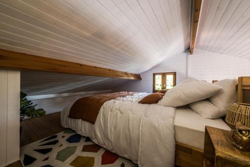 Cama o camas de una habitación en L'Écrin - Chalet & Spa vue lac