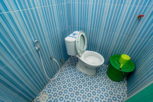 Koupelna v ubytování Guest House Ponorogo 2
