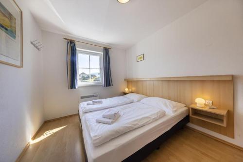 Ένα ή περισσότερα κρεβάτια σε δωμάτιο στο Residenz Monica Top 1