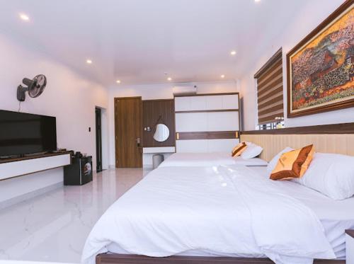 Katil atau katil-katil dalam bilik di An Khang Hotel