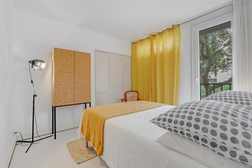 Ένα ή περισσότερα κρεβάτια σε δωμάτιο στο Appartement Saint Tropez