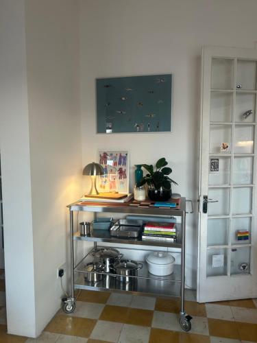 a metal cart in a room with a wall at Harbour of Colours in Pieta