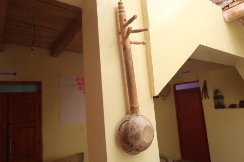 a utensil hanging on the side of a wall at Gite Megdaz in Megdaz