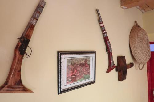 a group of musical instruments hanging on a wall at Gite Megdaz in Megdaz