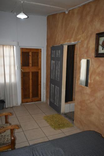 Postel nebo postele na pokoji v ubytování Kunskamer Unit 3