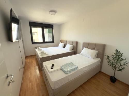 Postel nebo postele na pokoji v ubytování Mint House