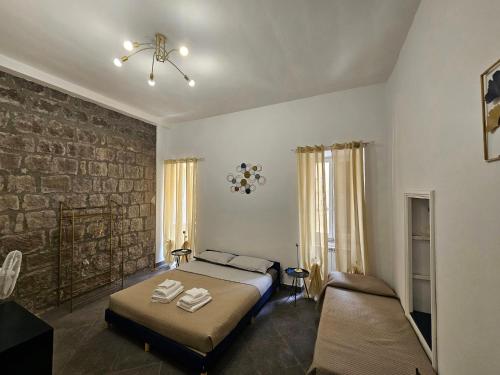 Letto o letti in una camera di Palazzetto dei Priori