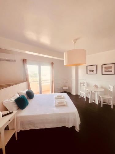 Una cama o camas en una habitación de Casa Relaxa