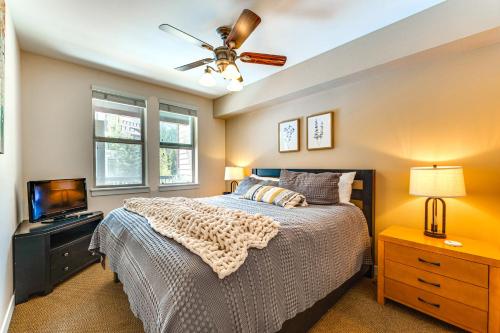a bedroom with a bed and a ceiling fan at Ski-InandSki-Out Winter Park Condo with Balcony in Winter Park