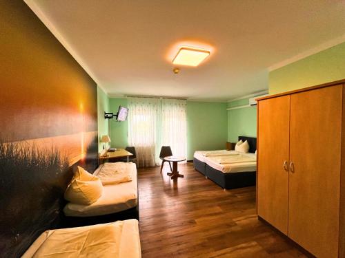 Katil atau katil-katil dalam bilik di Hotel Thannhof