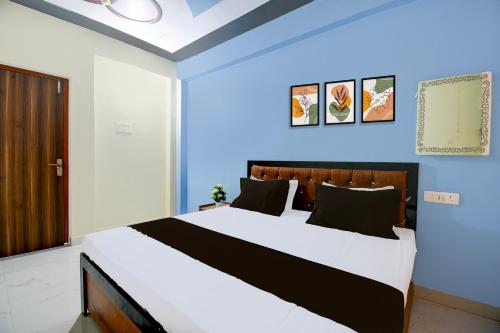 Katil atau katil-katil dalam bilik di SPOT ON Hotel Rahul Inn