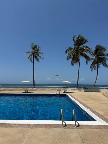 Piscina di Apartamento de lujo frente al mar en residencia con piscina, planta electrica y gym o nelle vicinanze