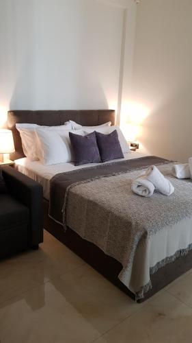 Ένα ή περισσότερα κρεβάτια σε δωμάτιο στο JASMIN Luxury Apartment