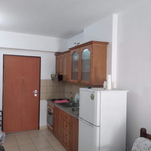 Kuchyň nebo kuchyňský kout v ubytování Geni Apartment