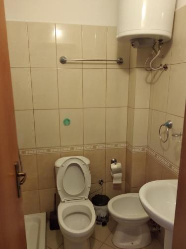 Koupelna v ubytování Geni Apartment