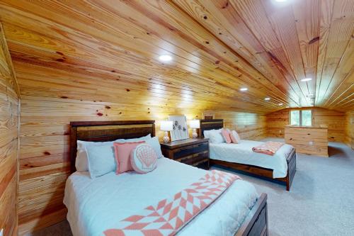 Postel nebo postele na pokoji v ubytování Cabin Hook