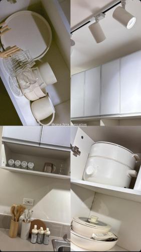 a kitchen with white cabinets and a toilet in it at Casa Lyra Staycation Trees Residences in Manila
