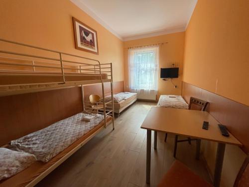 Katil atau katil-katil dalam bilik di Gościniec Zaborze w sercu Górnego Śląska - Zabrze
