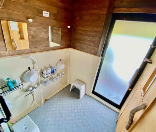 an overhead view of a bathroom in a train at DeepSpot - Vacation STAY 19274v in Minamioguni