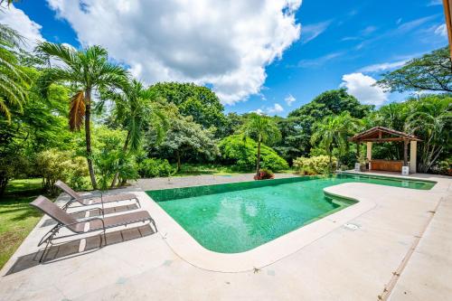 Бассейн в Hacienda Pinilla Vacation Rentals или поблизости