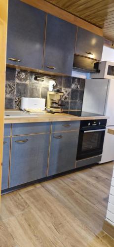 Kuchyň nebo kuchyňský kout v ubytování Bátory Luxury Apartman