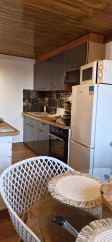 Kuchyň nebo kuchyňský kout v ubytování Bátory Luxury Apartman
