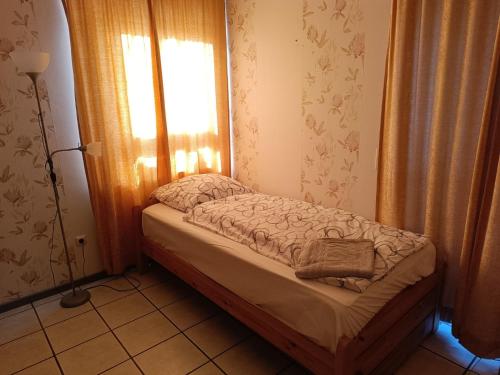 Postel nebo postele na pokoji v ubytování Messezimmer A 30 A 2