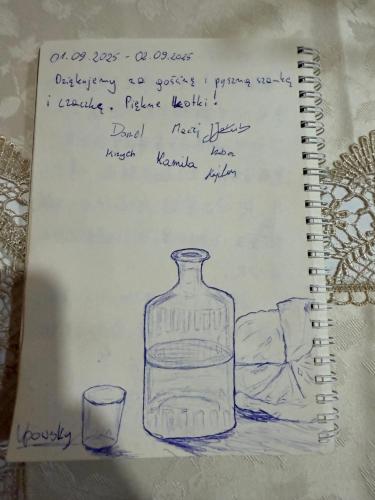 a drawing of a bottle and a glass at gaydi in Gori