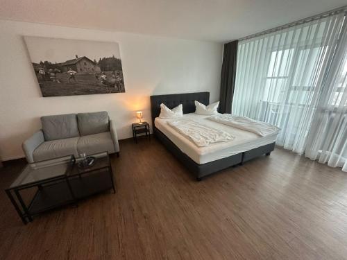 Ένα ή περισσότερα κρεβάτια σε δωμάτιο στο AR Bouitique Hotel Kempten