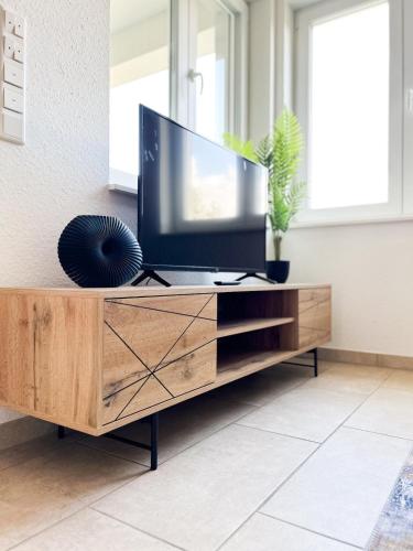 TV a/nebo společenská místnost v ubytování Ferienwohnung in Ahaus für 6 Gäste mit 2 Bädern und Loggia