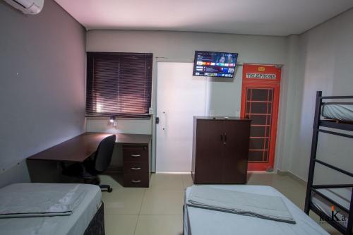 Postel nebo postele na pokoji v ubytování Hostel Central