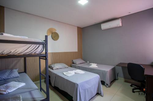 Postel nebo postele na pokoji v ubytování Hostel Central