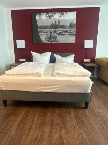 Ένα ή περισσότερα κρεβάτια σε δωμάτιο στο AR Bouitique Hotel Kempten