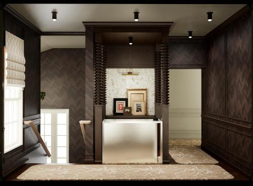 a lobby with a table and chairs in a building at Cambridge Common House in Cambridge