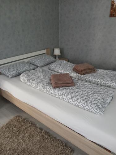Postel nebo postele na pokoji v ubytování Pension Ambiente