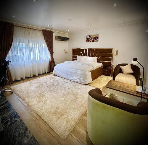 Cama o camas de una habitación en Abuja Enclave Retreat